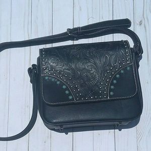 Beautiful Montana west leather engraved purse!
